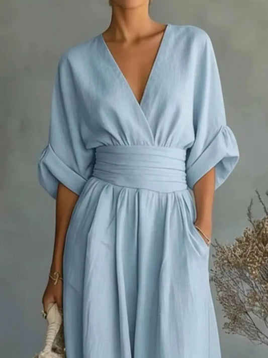 Jumpsuit by Trendsi in light blue with wrap-front V-neck, half sleeves, and wide-leg pants