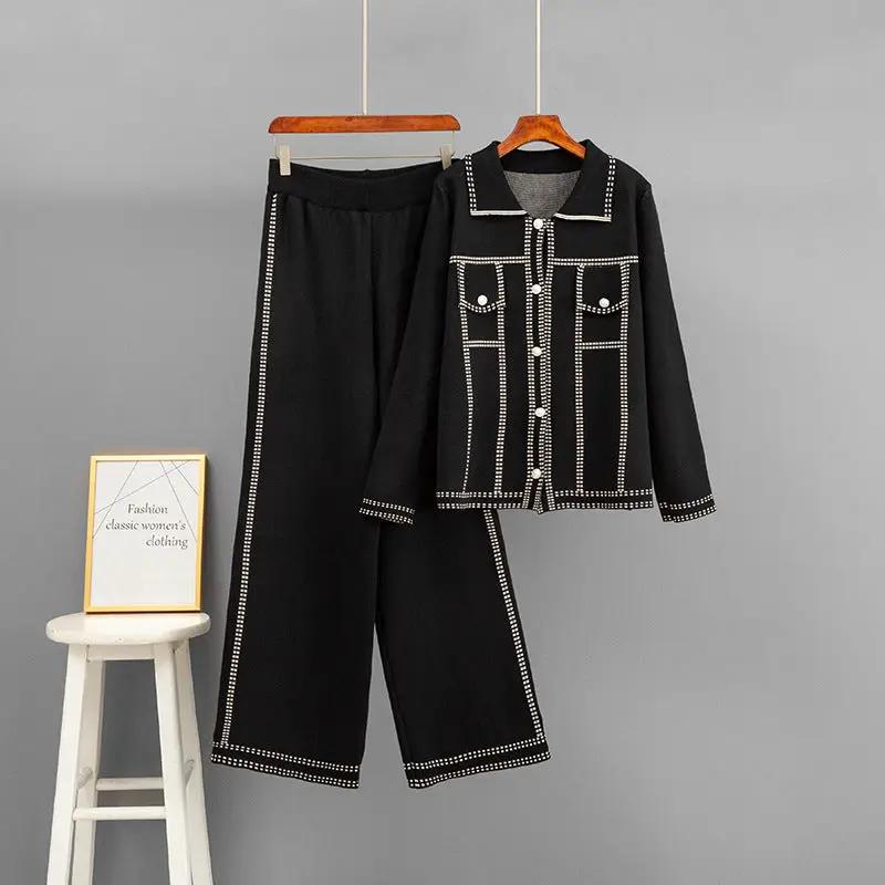 Polo Collar Loose Jacket Set in black by eprolo; jacket and matching pants with white stud trim.