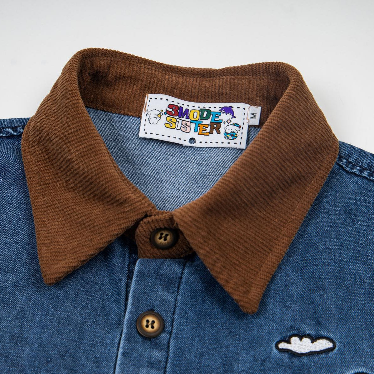 Denim short-sleeved shirt with brown corduroy collar, brown buttons, 3MODE SISTER label.