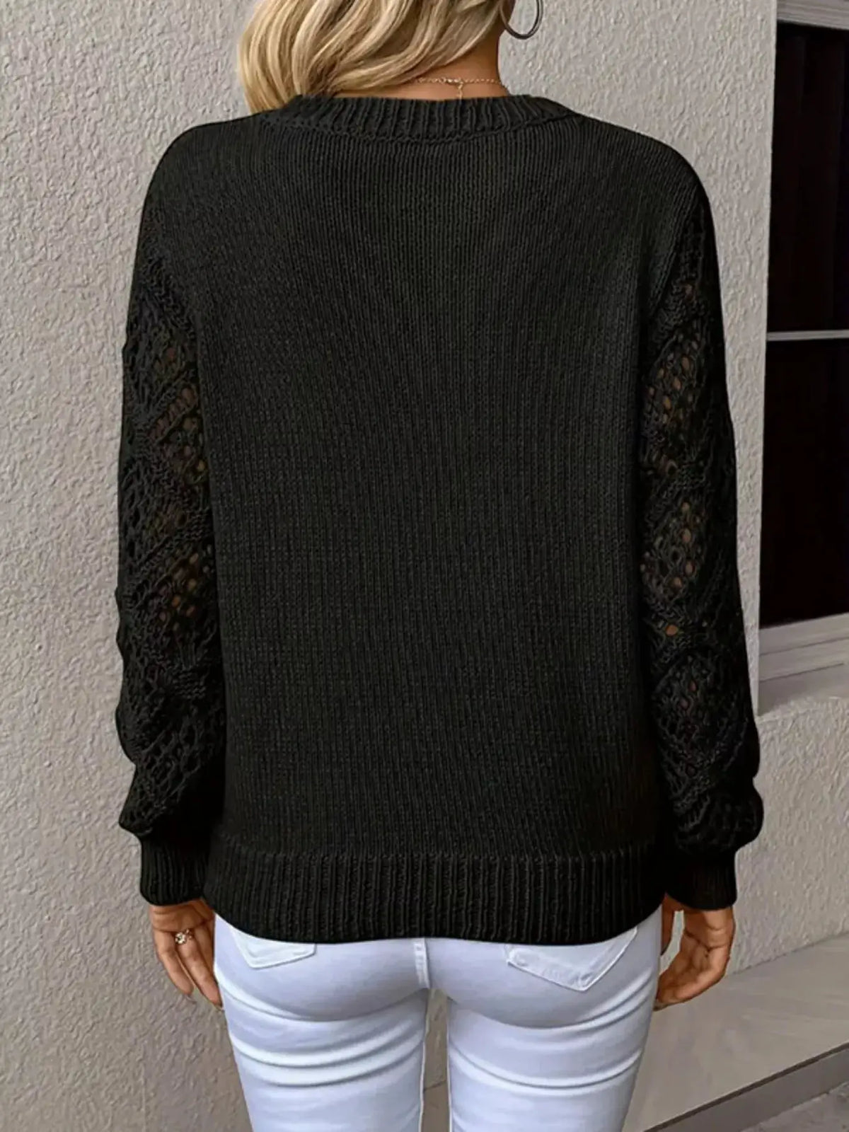 Womens V-Neck Hollow-Out Sleeve Knit Sweater in black with lace sleeves, soft polyester, Trendsi