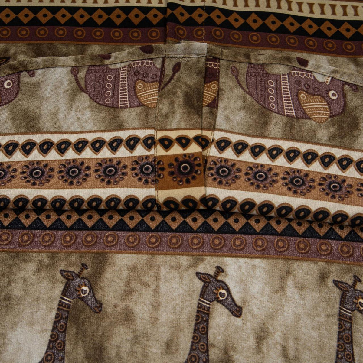 Elephant-printed short-sleeve shirt by eprolo in earthy brown and tan with tribal patterns.