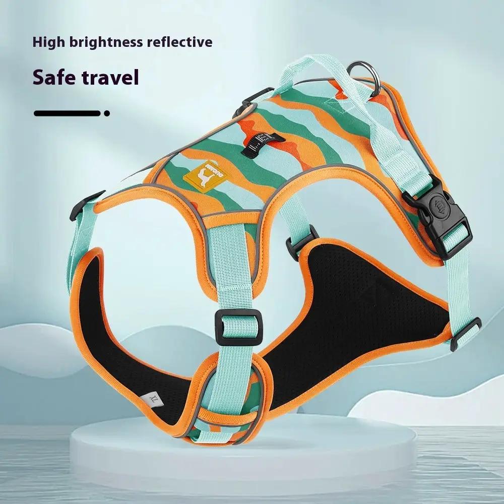 AdTec dog harness with chest and back reflective panels, teal straps, orange trim, and a top carry handle.