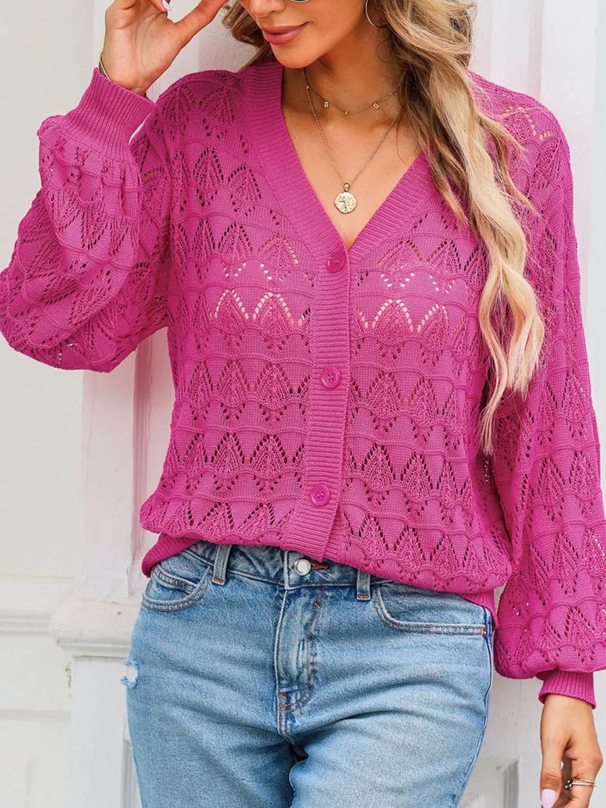 Button-front openwork cardigan in magenta pink with textured stretch detail