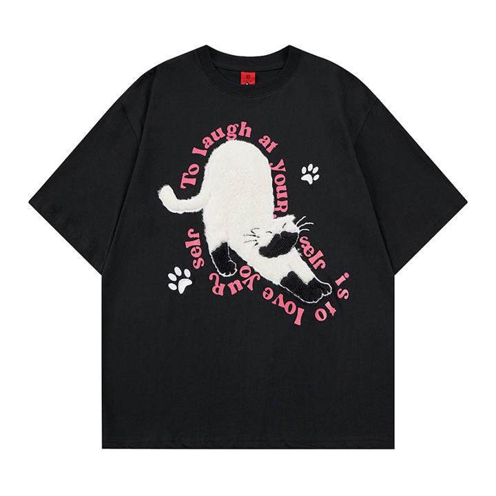 T-shirt à manches courtes et motif de chat qui se penche
