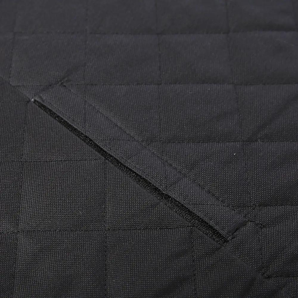 Dog car seat cover in black quilted fabric with stitched square pattern