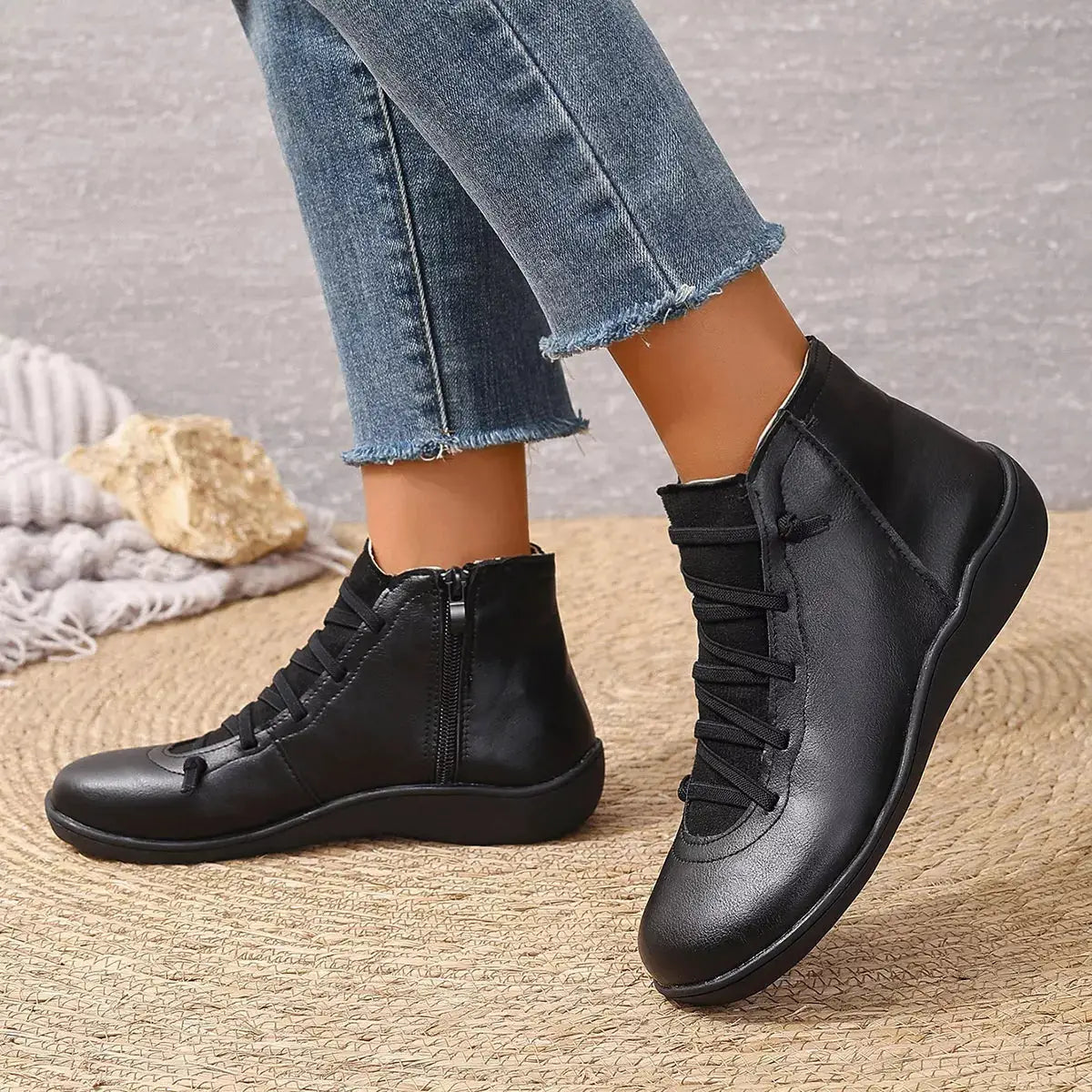 Lace-Up faux leather ankle boots in black with a side zip and rounded toe.