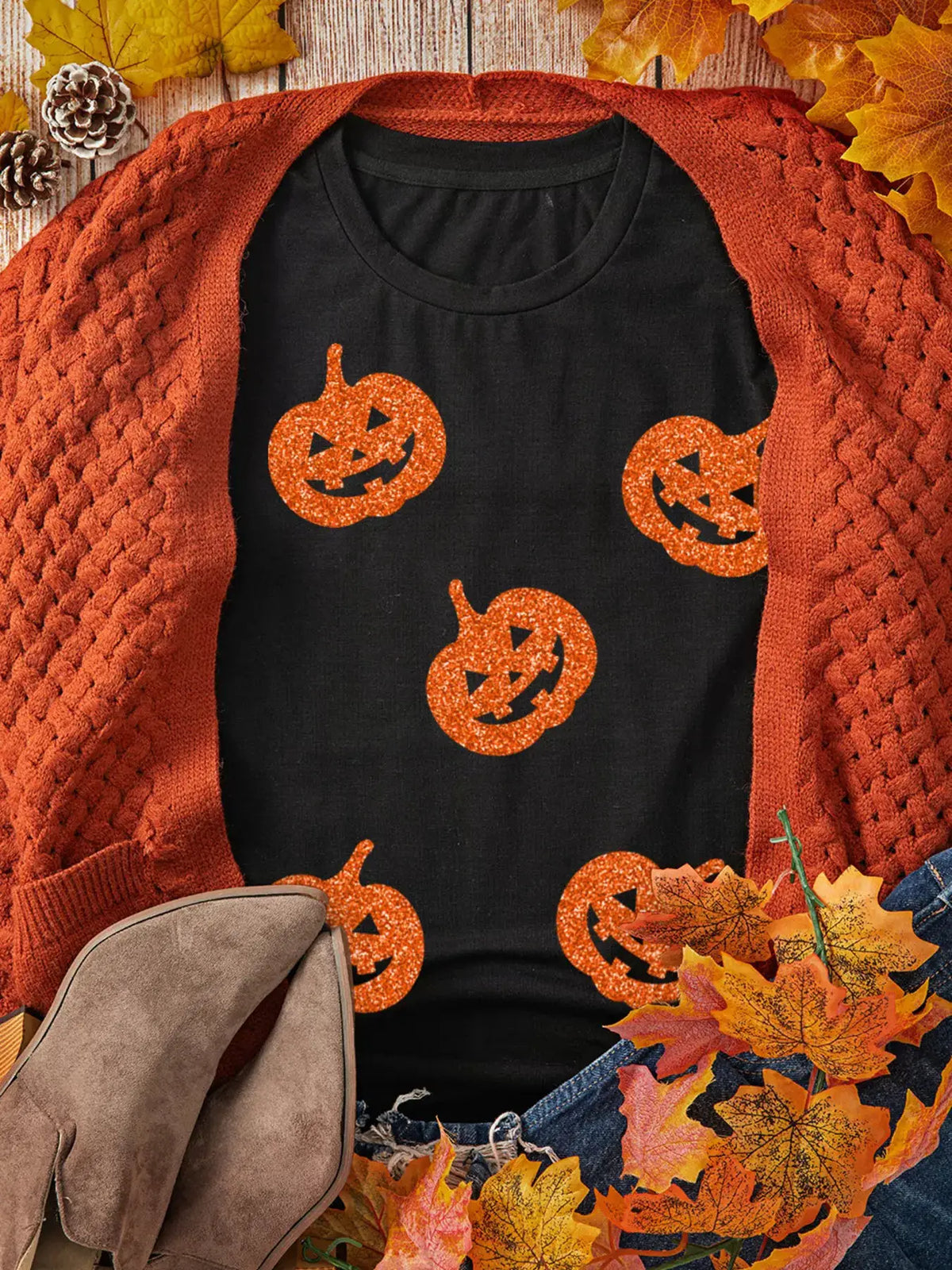 Trendsi Glittering Pumpkin Face Crewneck Halloween T Shirt on black fabric with orange glitter pumpkins