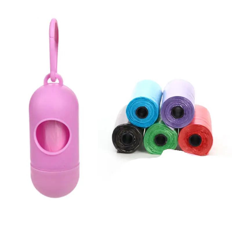 Dog poop bag dispenser in pink with six rolls of assorted colored bags from AdTec