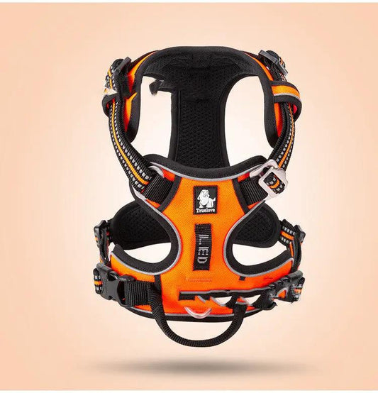 Dog vest-style harness in orange and black with adjustable straps and metal buckles