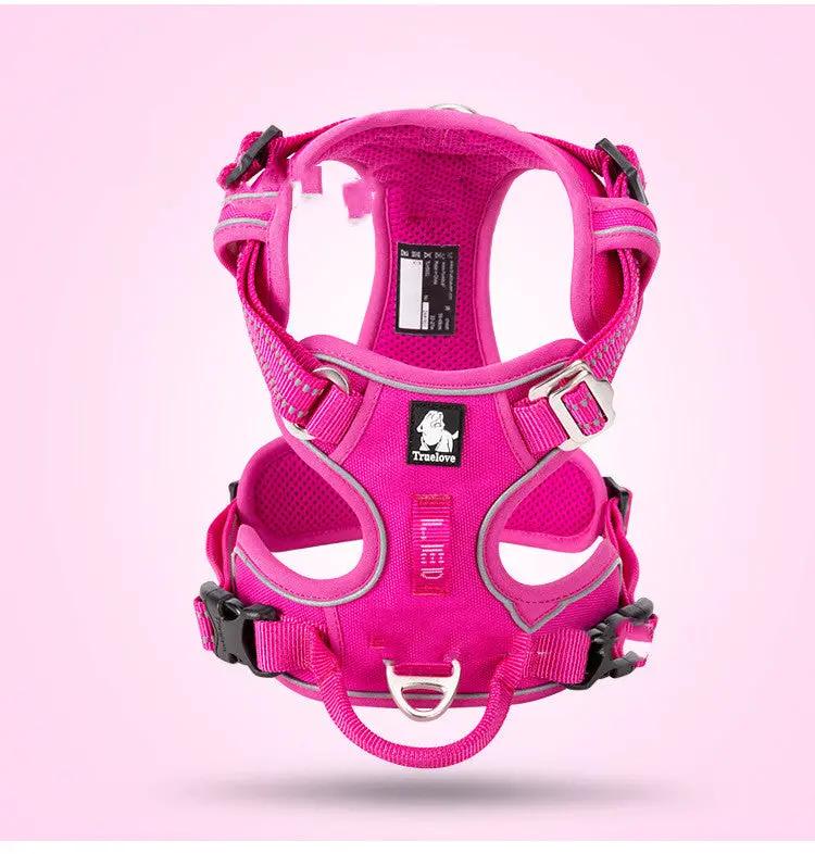 Pink vest-style dog harness with leash, adjustable nylon straps, Truelove logo