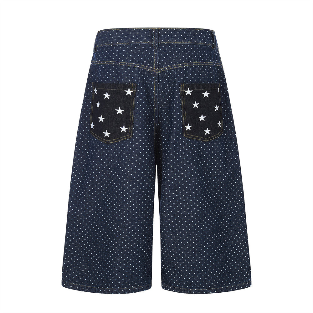 Star pocket polka dot denim cropped pants with star-pattern back pockets in dark blue.