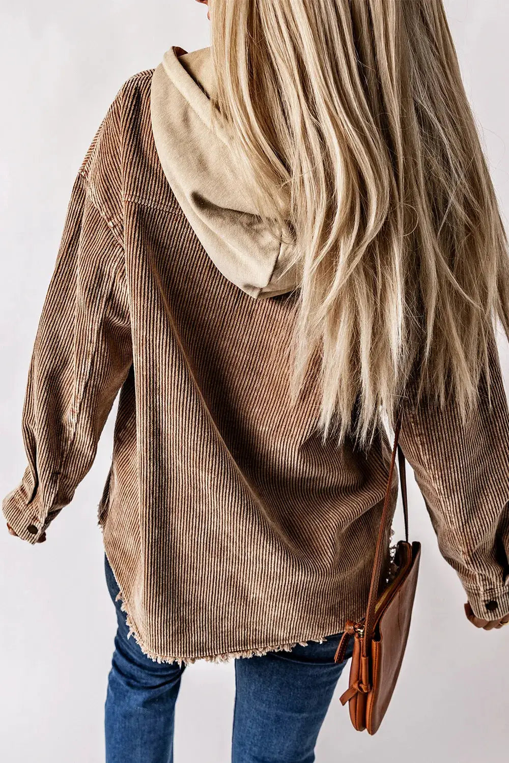 Corduroy shacket with hood and snap front by Trendsi in tan brown, back view.