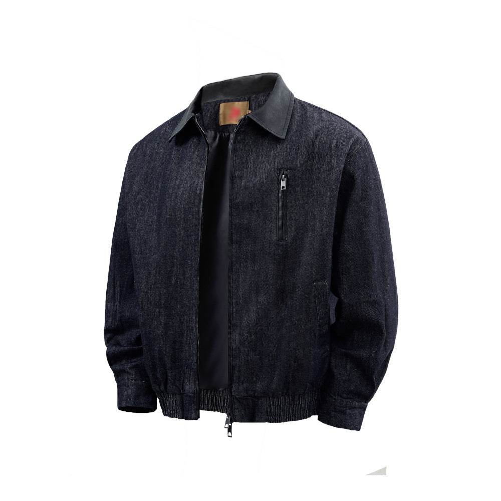 Denim jacket in dark indigo with zip-front closure, chest zip pocket, and ribbed hem