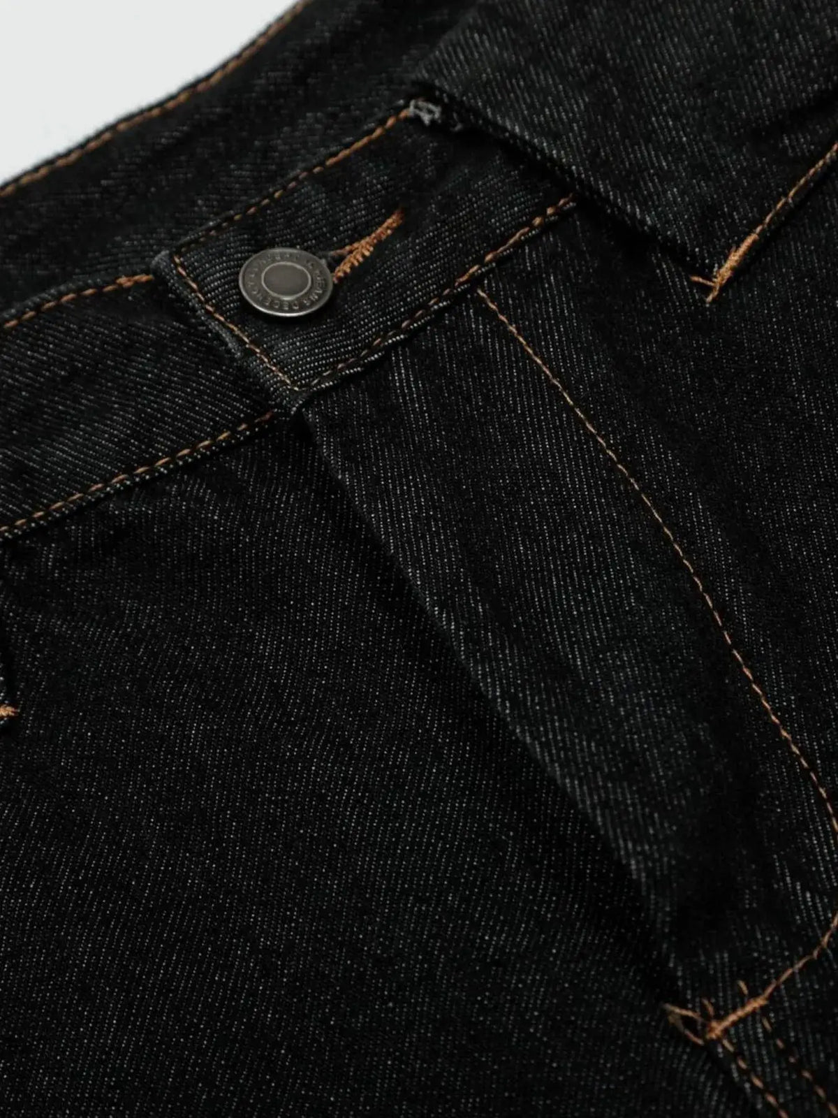 Men's wide-leg denim shorts in dark indigo with orange stitching.