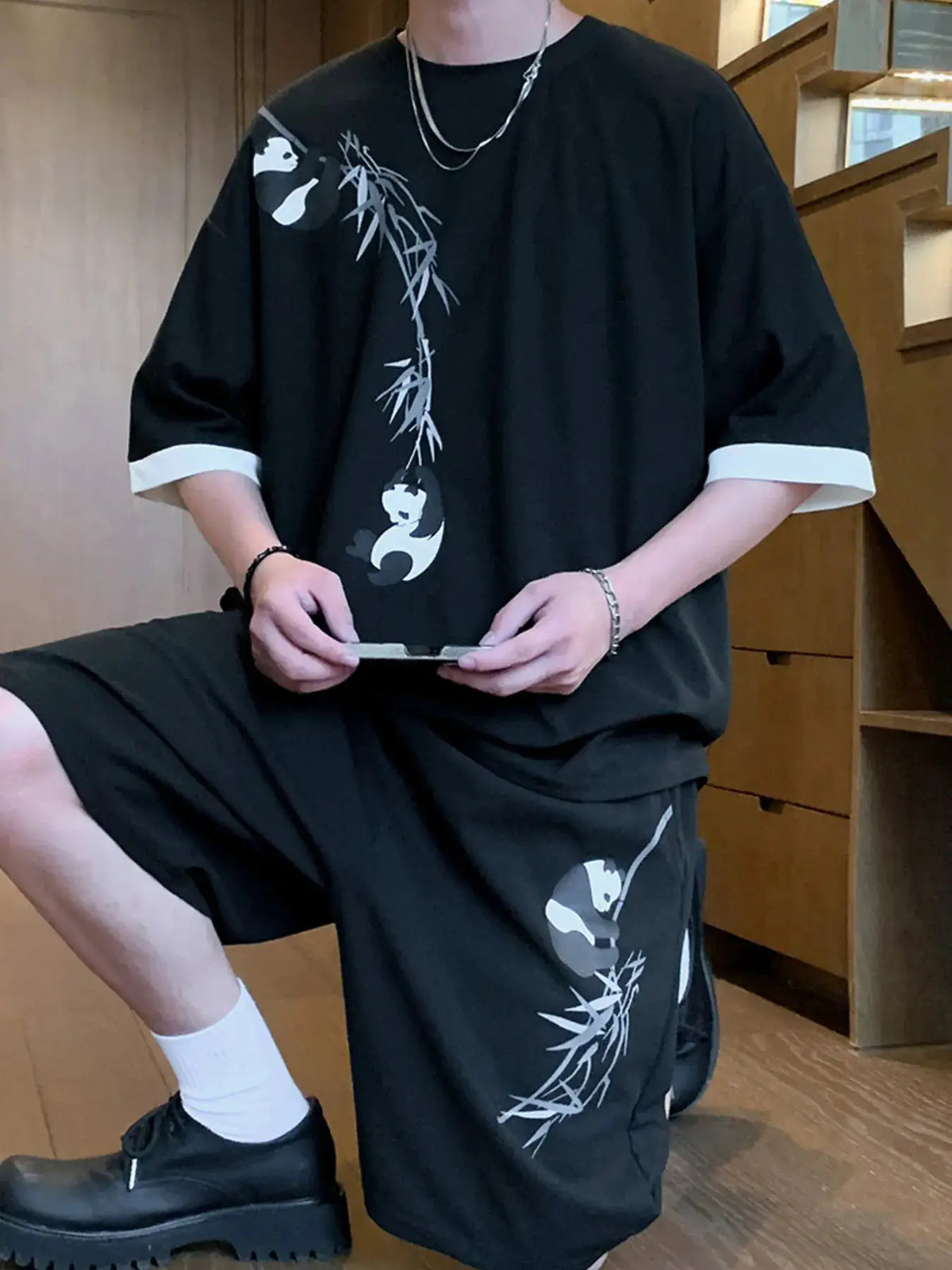Men's oversized panda bamboo print 2-piece tee and shorts set in black
