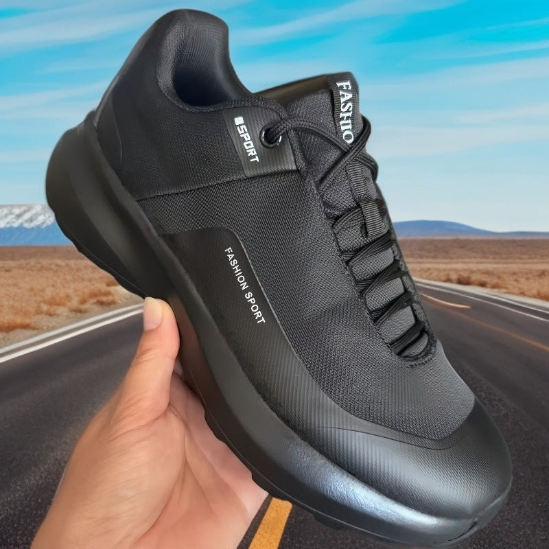Fashion sport sneakers, black athletic shoes with a chunky sole