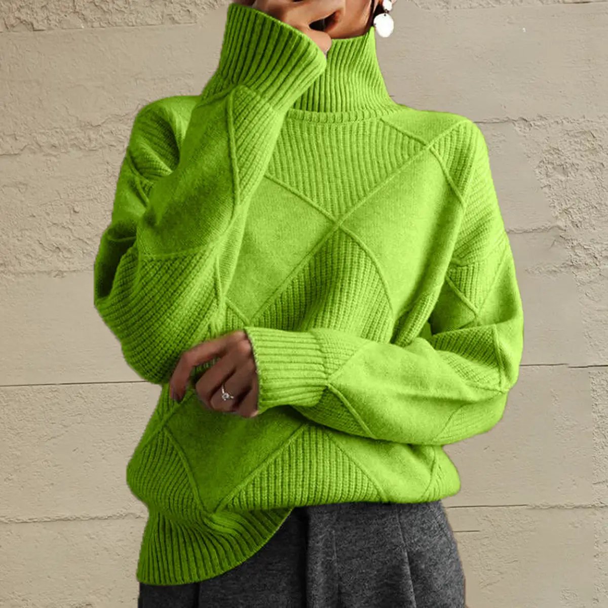 Geometric lime green knit turtleneck sweater with long sleeves and ribbed cuffs