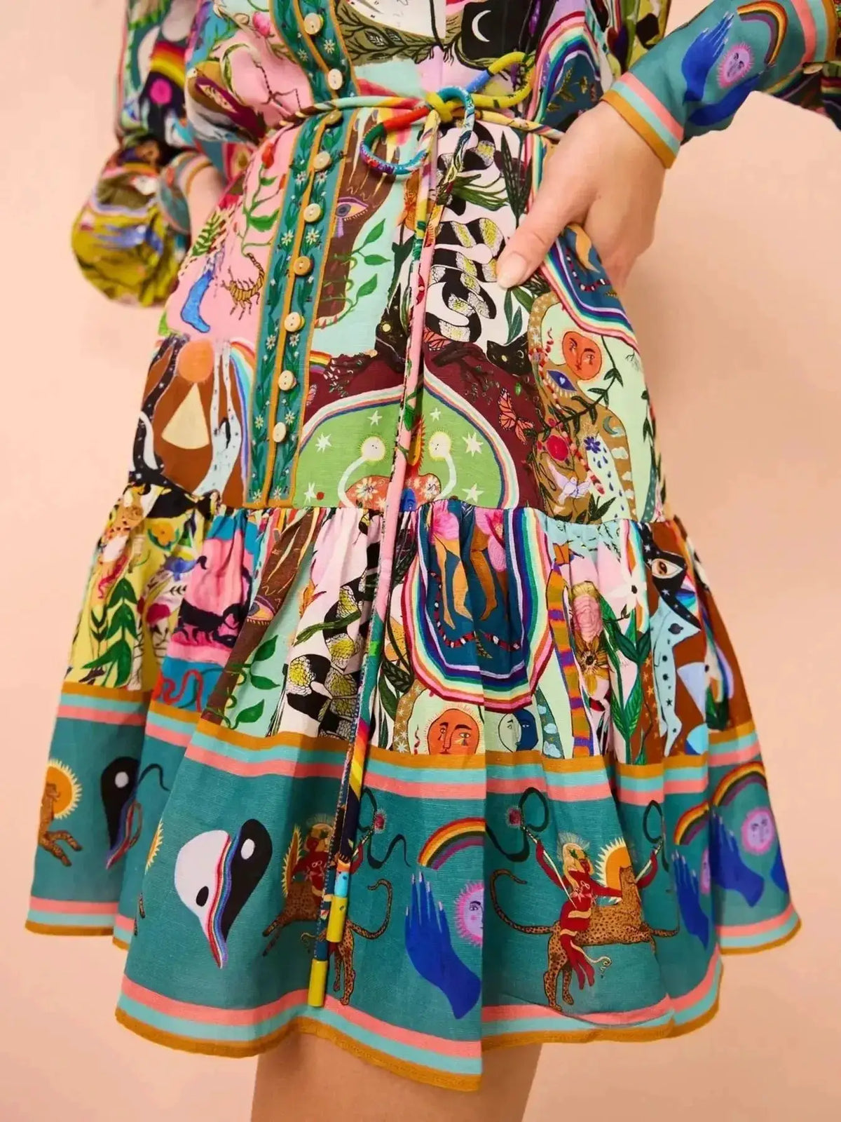 Printed long-sleeve mini dress with belt by Trendsi, vibrant multicolor print.