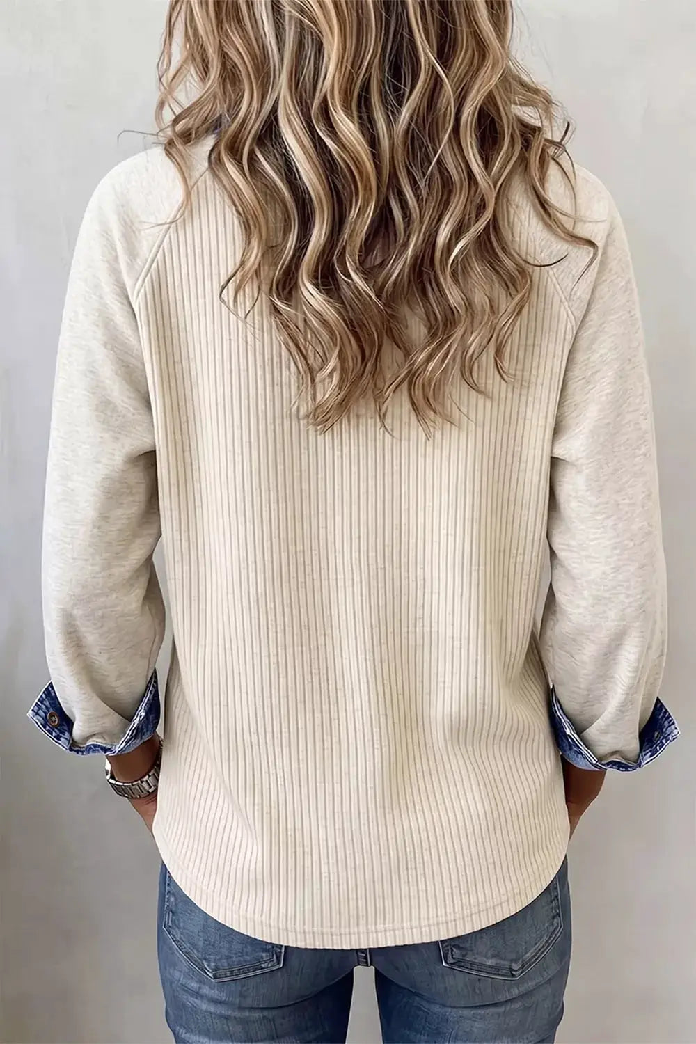 Stretchy ribbed knit button-front casual top with contrast trim in cream