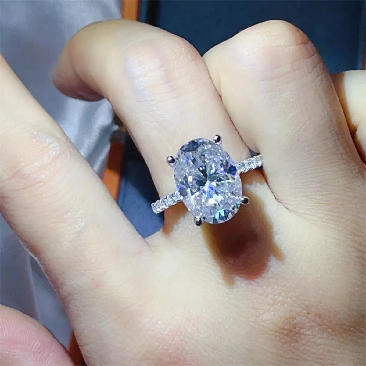 8ct moissanite ring in 925 sterling silver with oval center stone and pave band