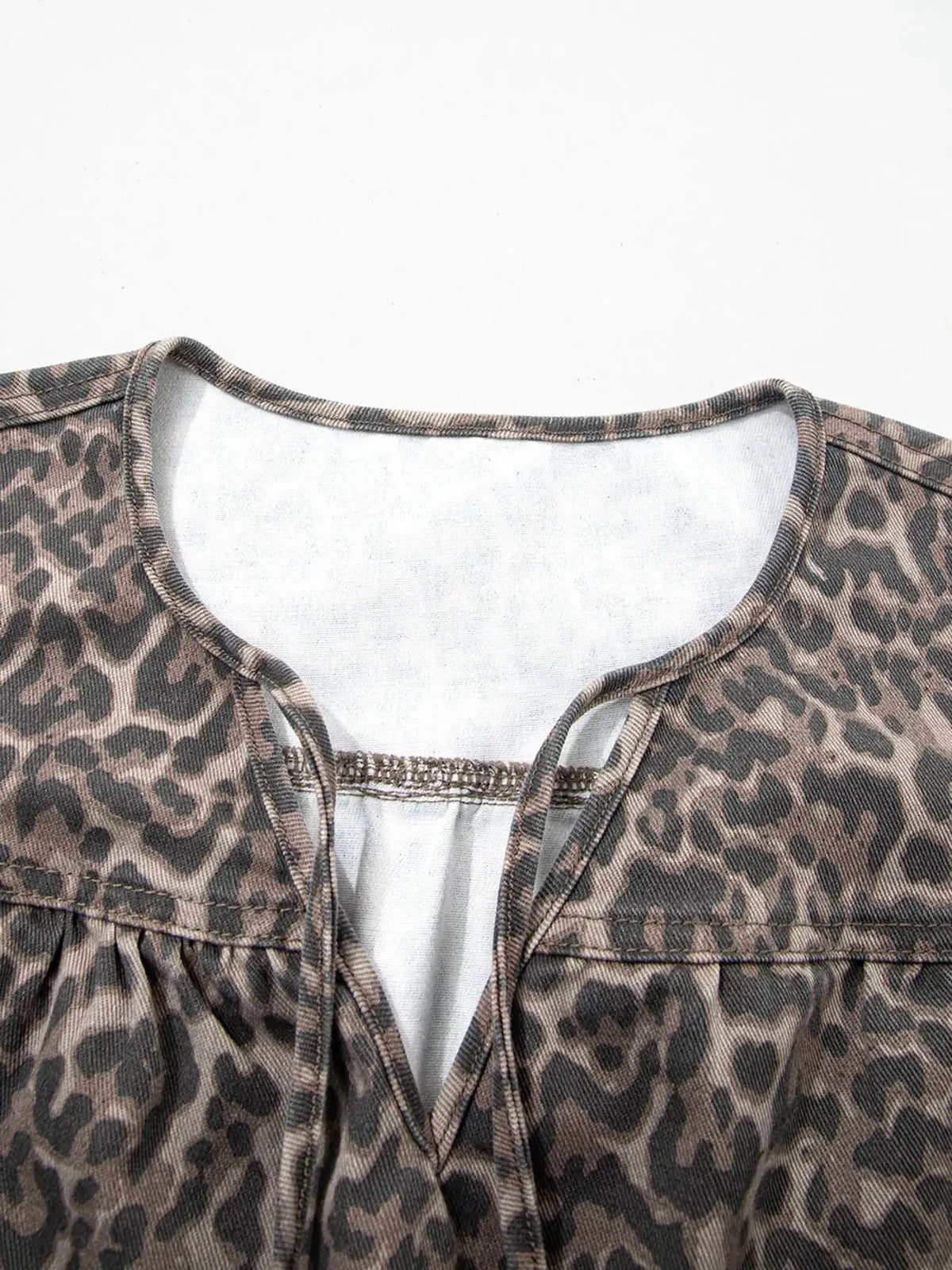 Women's leopard print denim top with round neckline