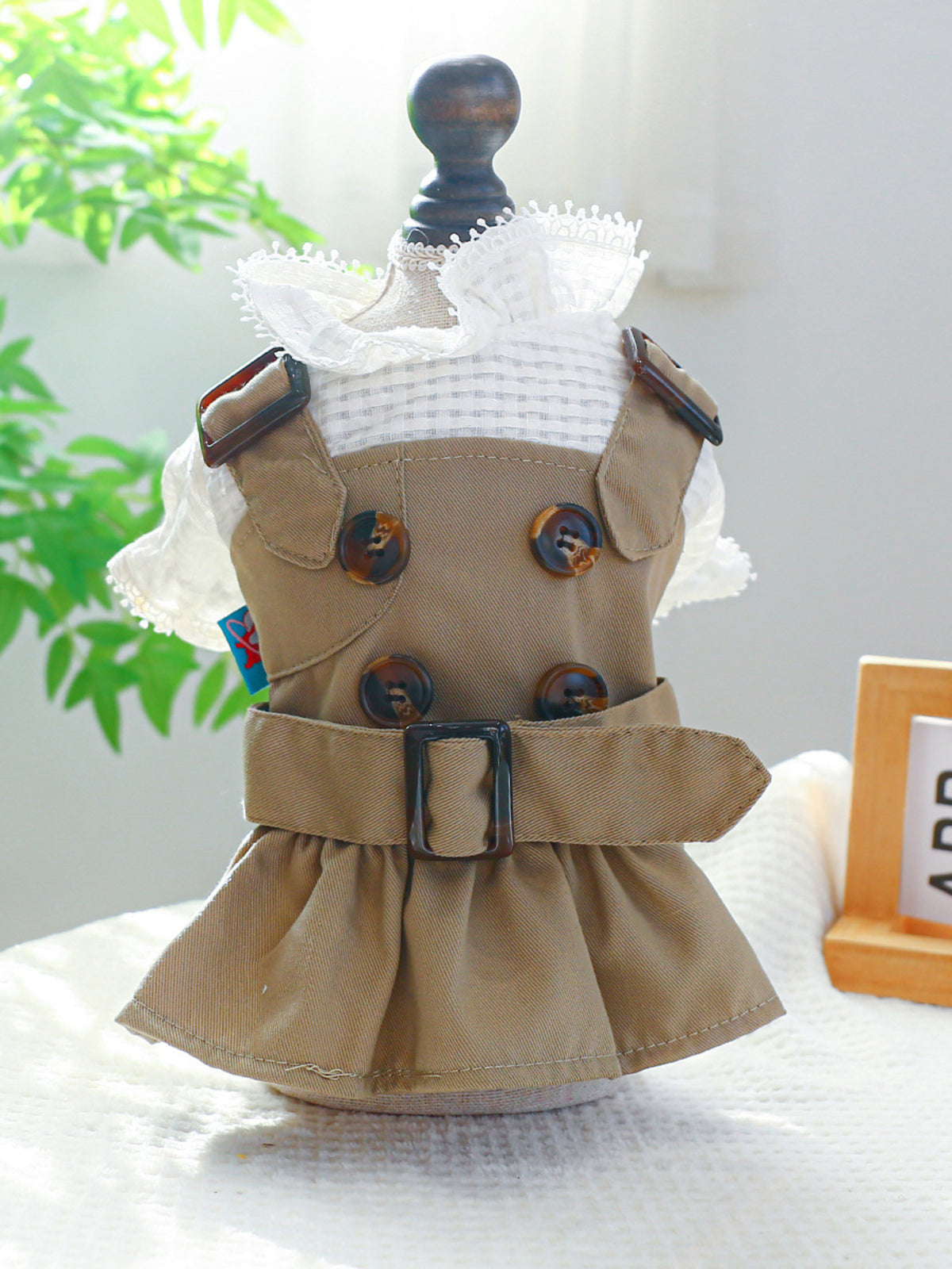 Buckle Pet Trench Coat by Trendsi in tan cotton with brown buttons and belt.