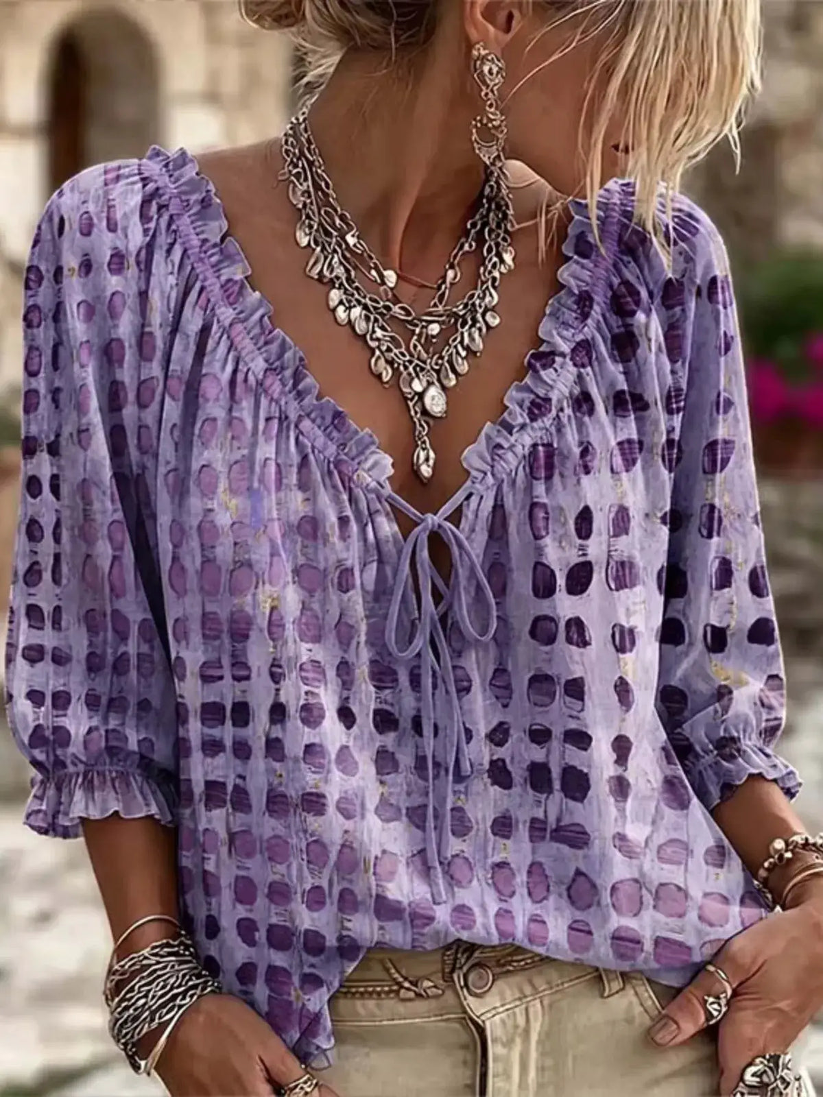 Plus-size tie-neck blouse in lavender with purple dot print and 3/4 sleeves