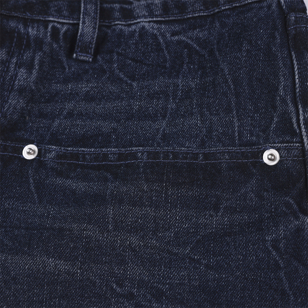 Cowboy shorts loose fit denim in dark blue with metal rivets and belt loop detail