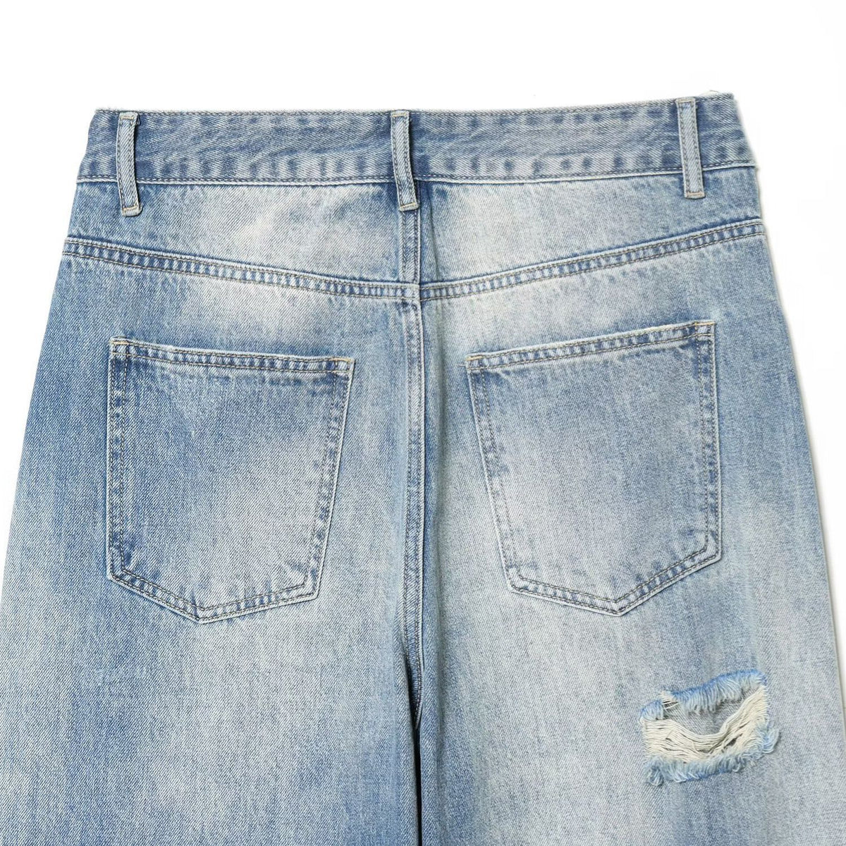 Jeans, light-wash denim with back pockets and ripped hole detail