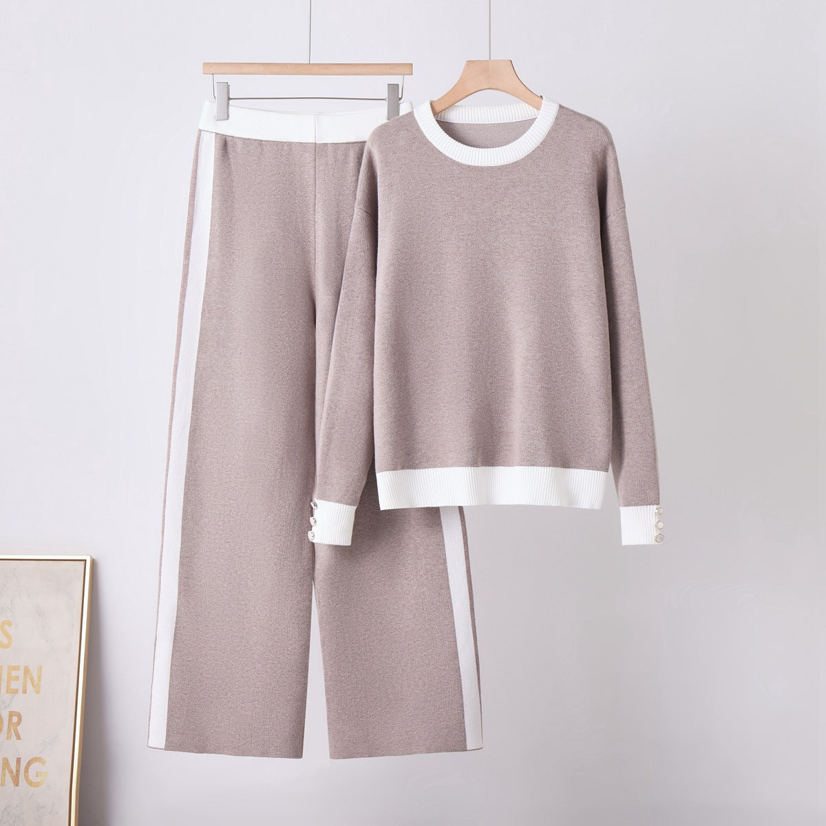Women cozy two-piece knit sweater and wide-leg pants set in taupe with white trim