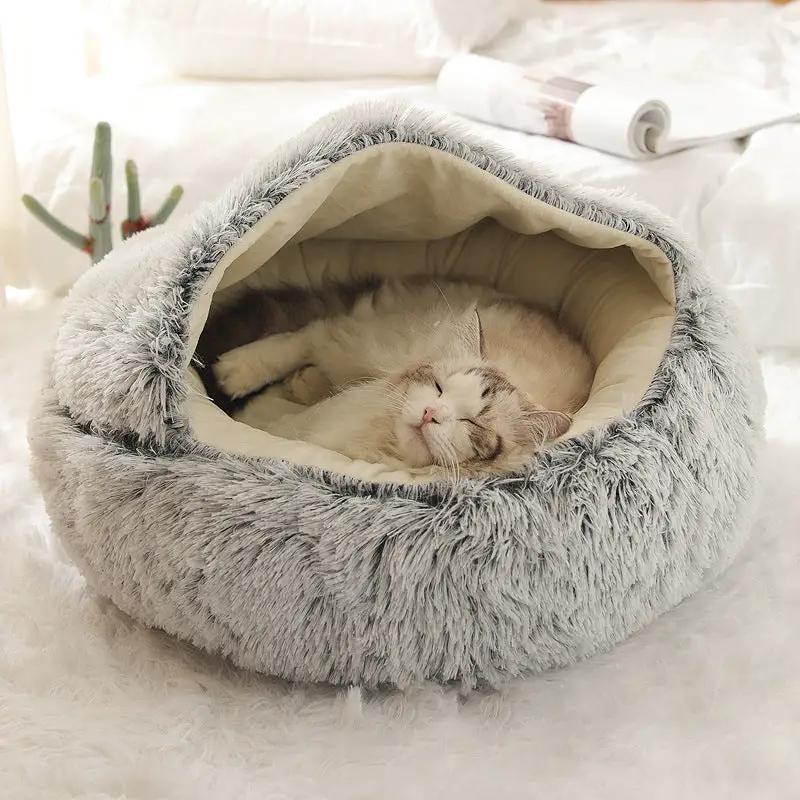 Plush shell pet nest by AdTec, gray exterior with beige interior, cat sleeping inside