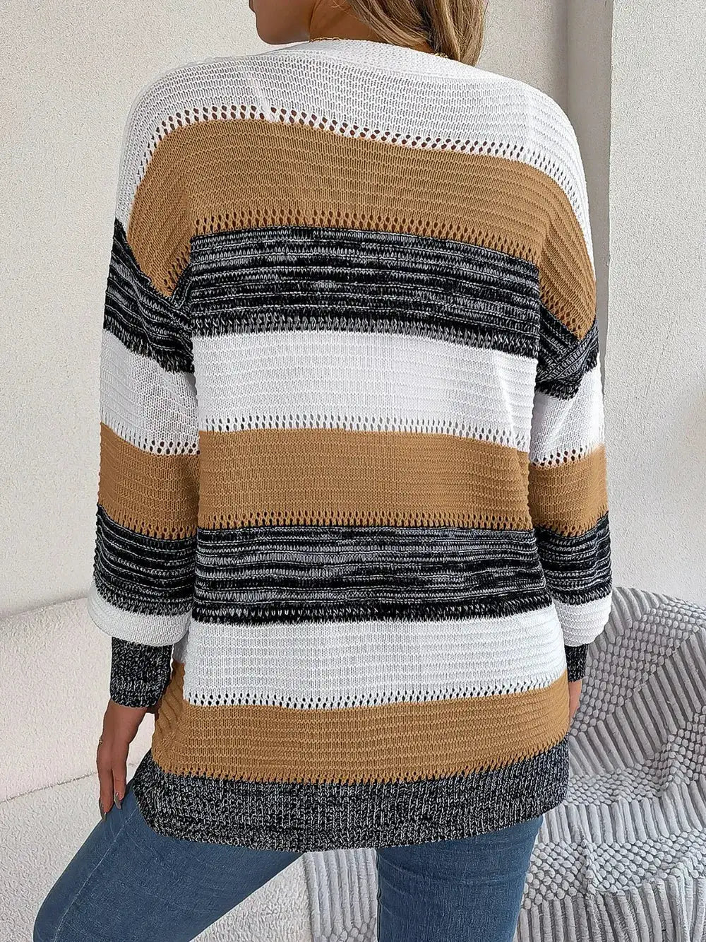 Openwork striped cardigan, open-front; lightweight relaxed knit in white, camel, and black.