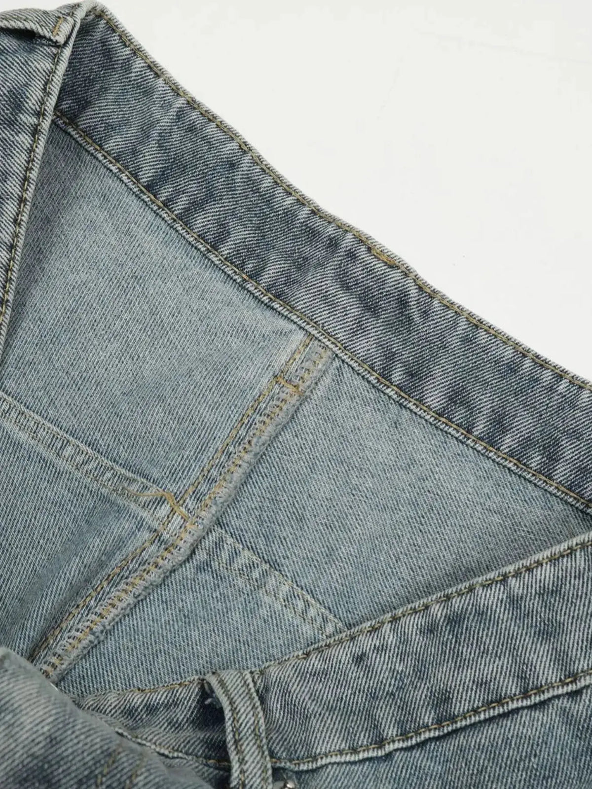Men's classic loose-fit washed denim shorts, light blue fabric with visible stitching and pocket seams