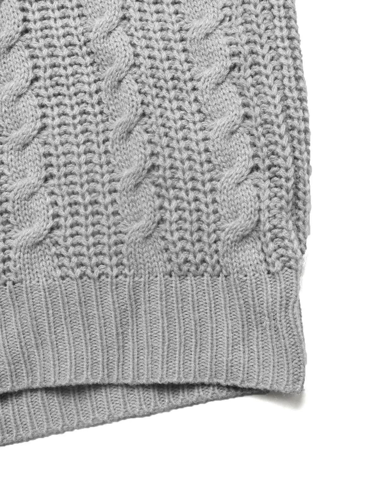 Cable knit half-zip sweater in gray acrylic; machine washable.