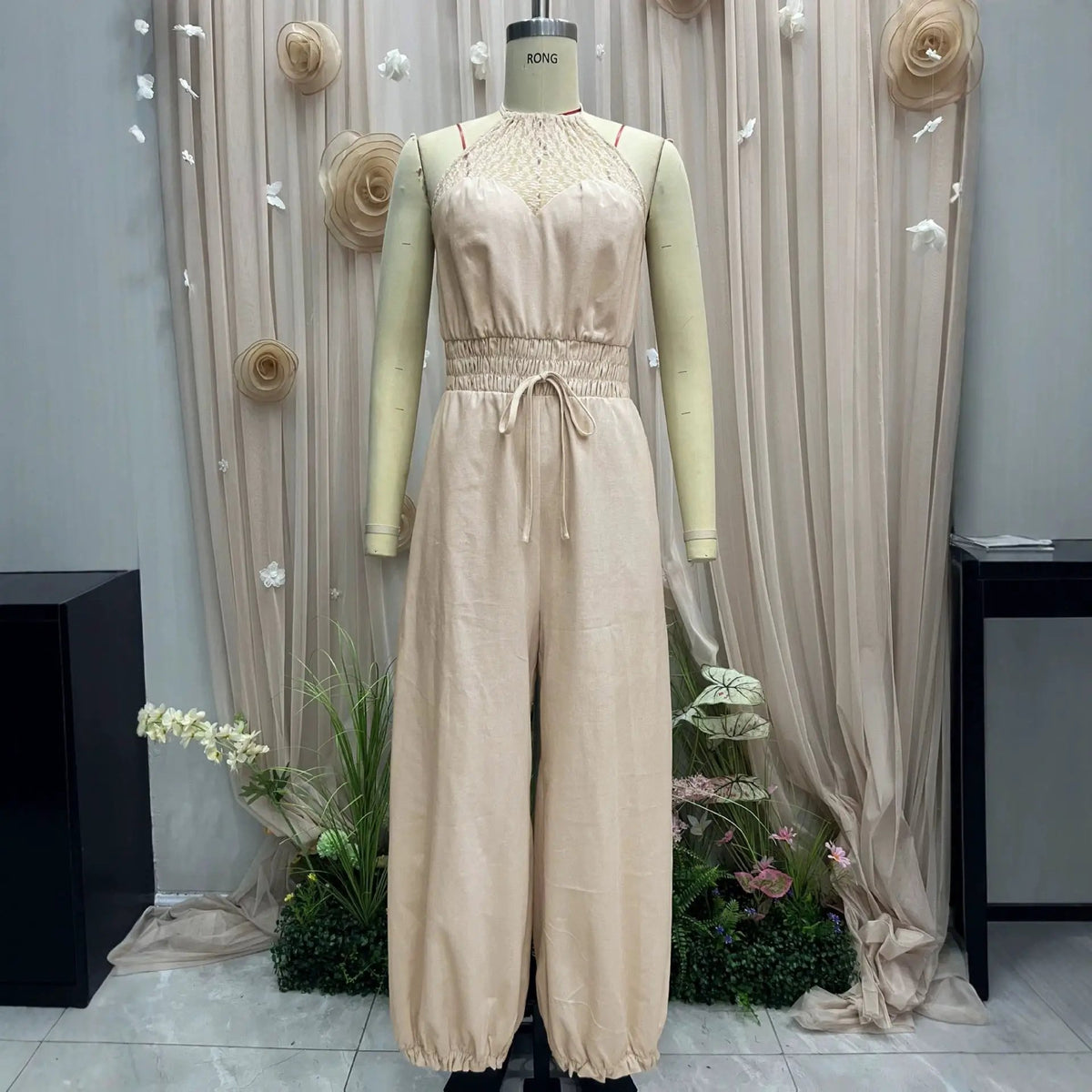 Women Bohemian Lace Halter Jumpsuit in beige with lace neckline and smocked waist