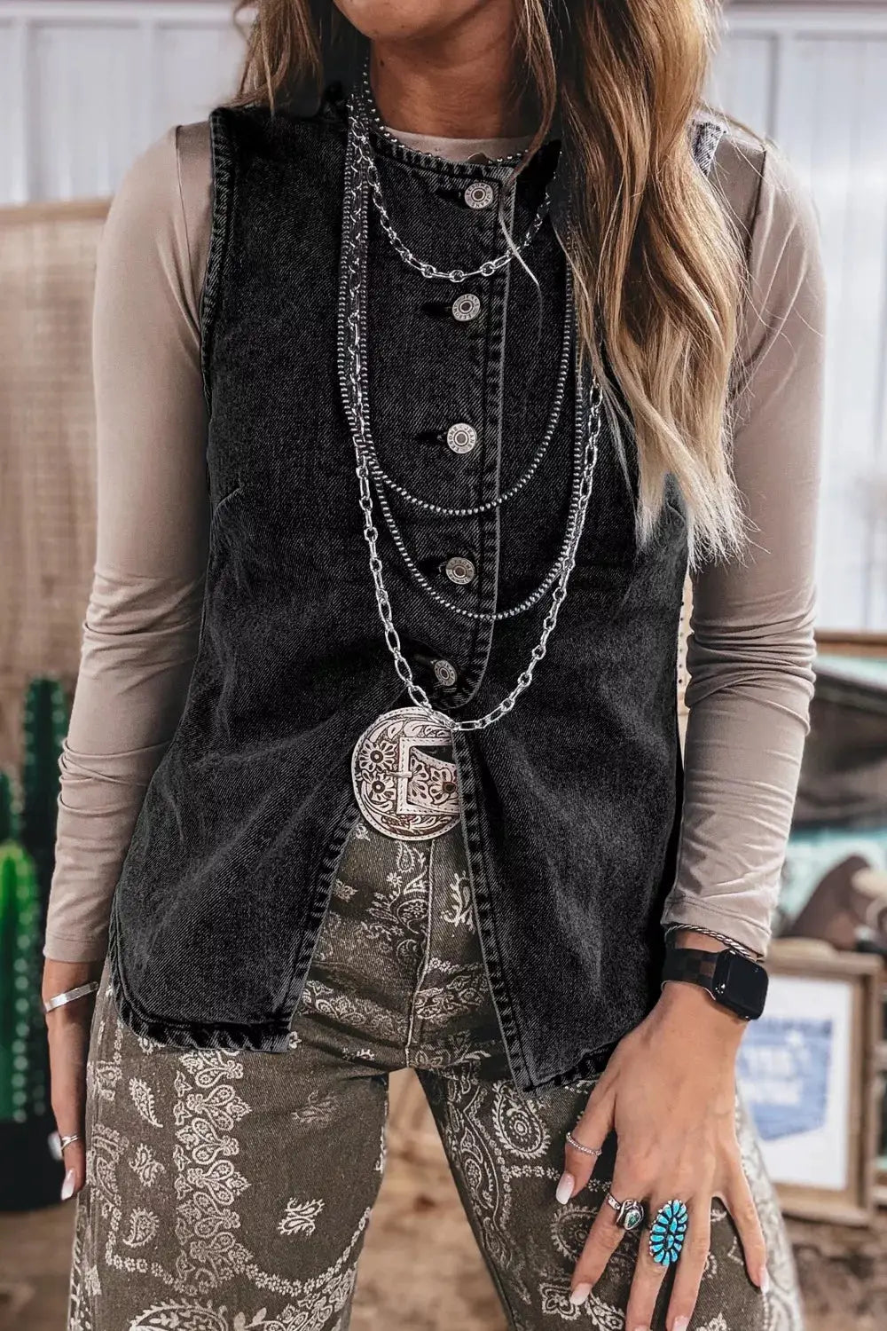 Vintage wash denim vest with button-up front in black soft cotton