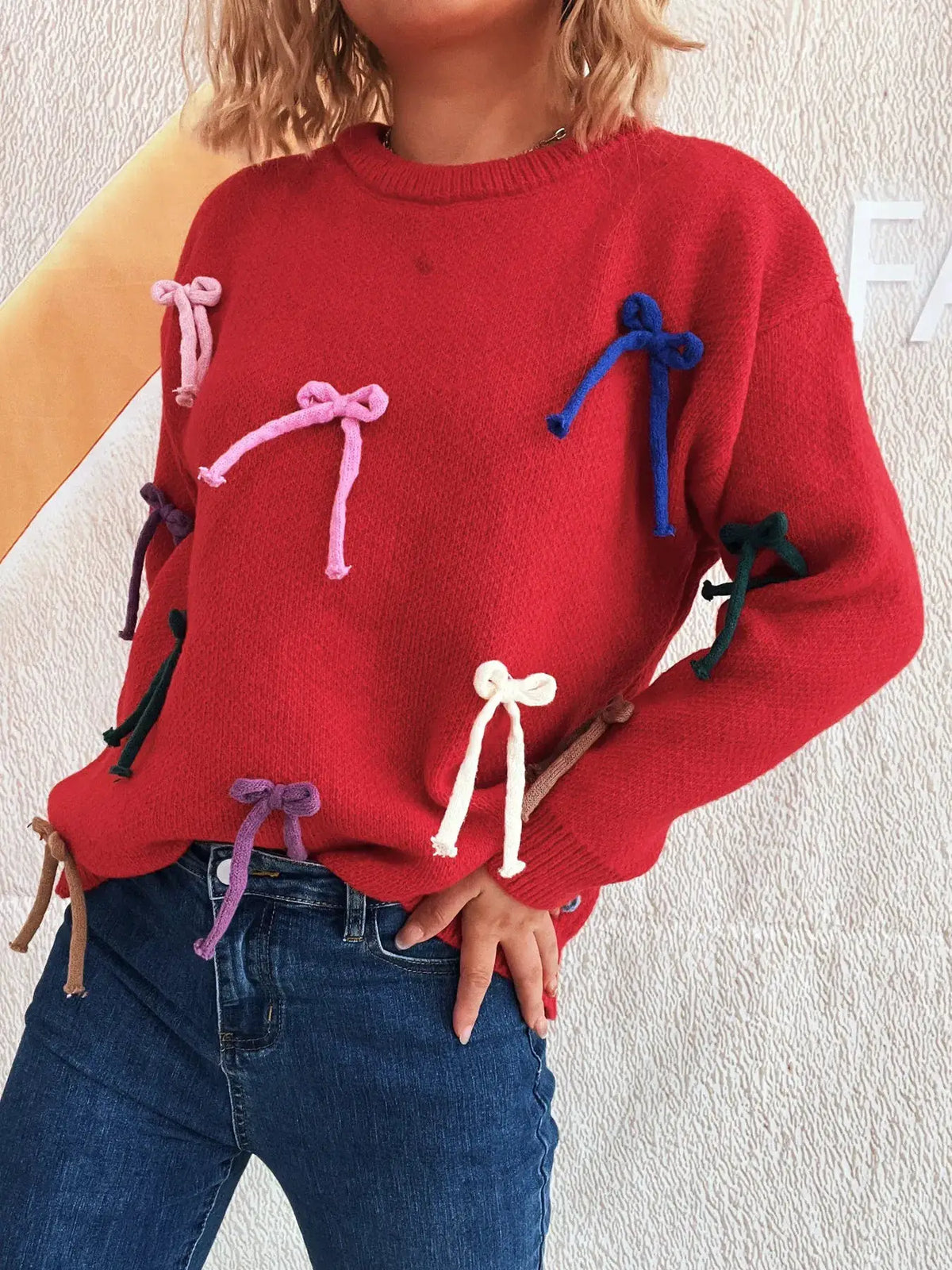 Vibrant bow-accent round-neck sweater for women by Trendsi, red knit with multicolor bows