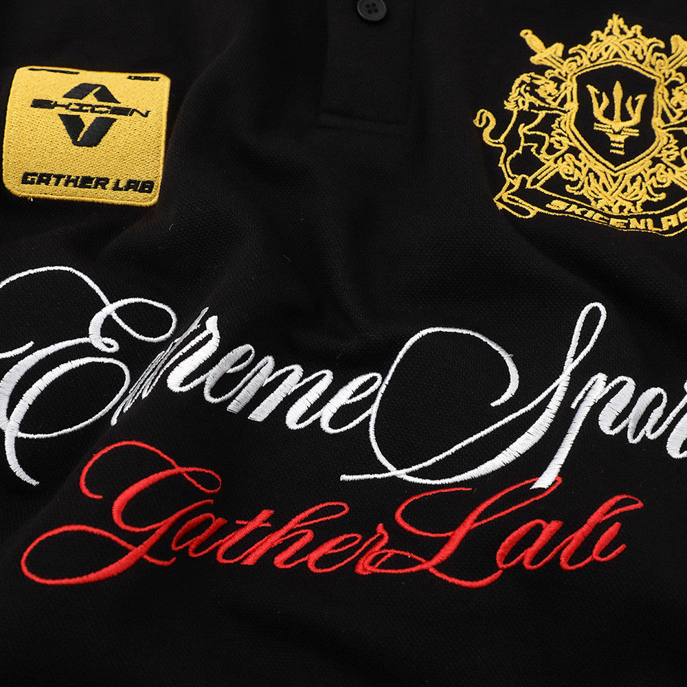 Emblem letter embroidered short-sleeve T-shirt, black with gold crest patch and white/red script by eprolo
