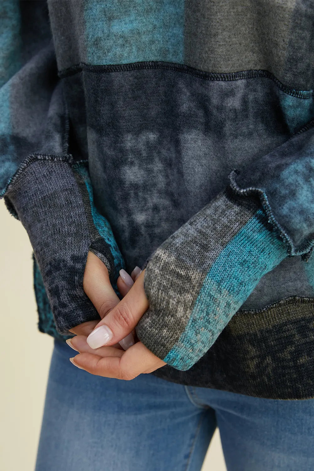 Double Take plus-size plaid fleece hoodie by Trendsi; dropped-shoulder, teal/navy plaid with cuffed sleeves.