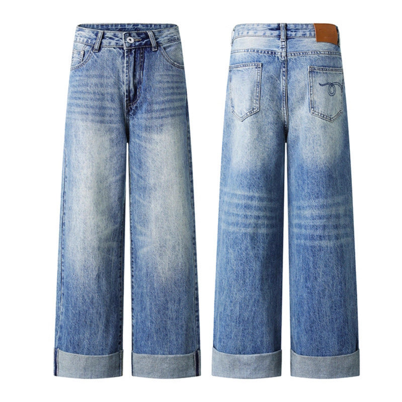 Blue washed denim jeans by eprolo, wide-leg with rolled cuffs; front and back views, two pairs shown