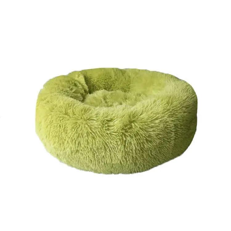 Round lime-green plush cat nest pad with long fur texture for extra warmth