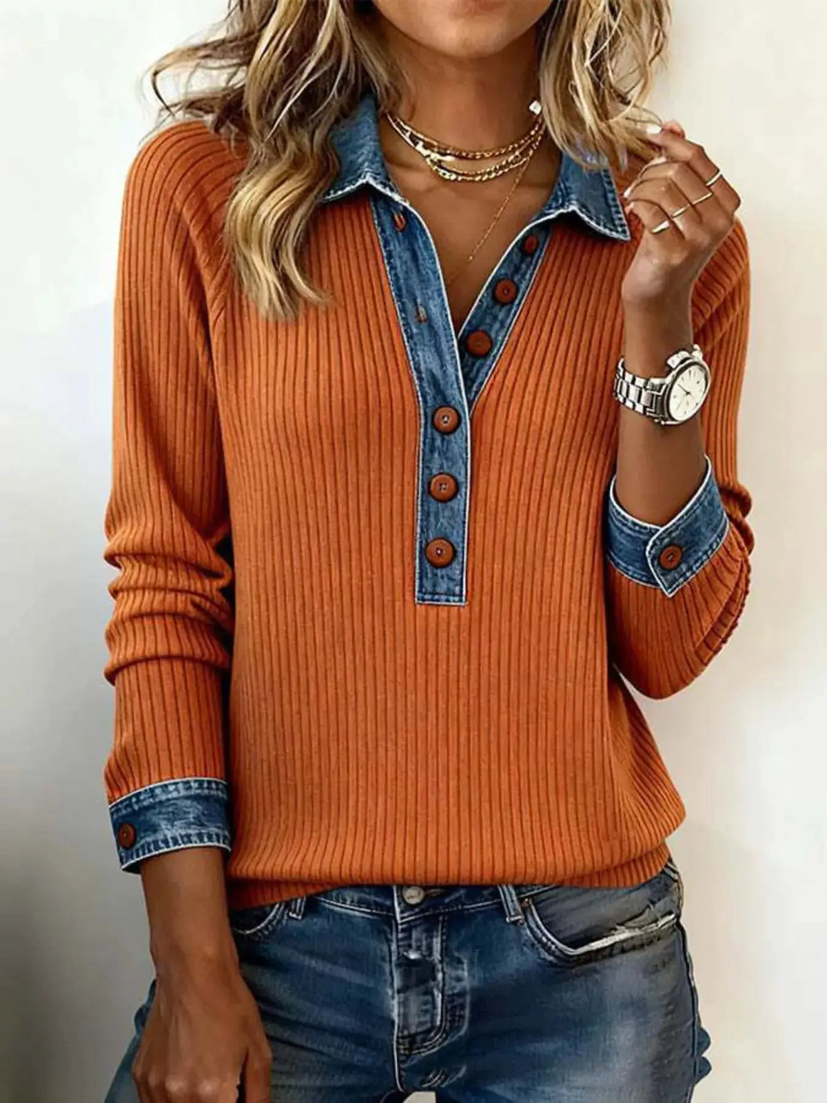 Plus size ribbed knit top with denim trim in rust orange; denim collar, placket, and cuffs, by Trendsi.