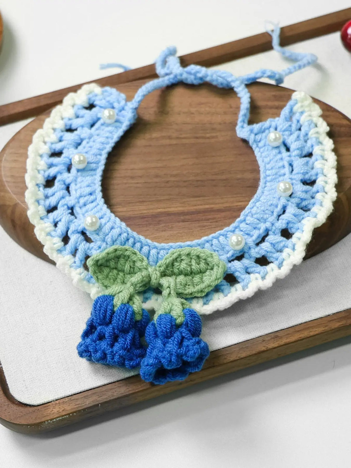 Trendsi Contrast Pet Scarf, crocheted blue and white collar with pearl bead accents and tassel details.