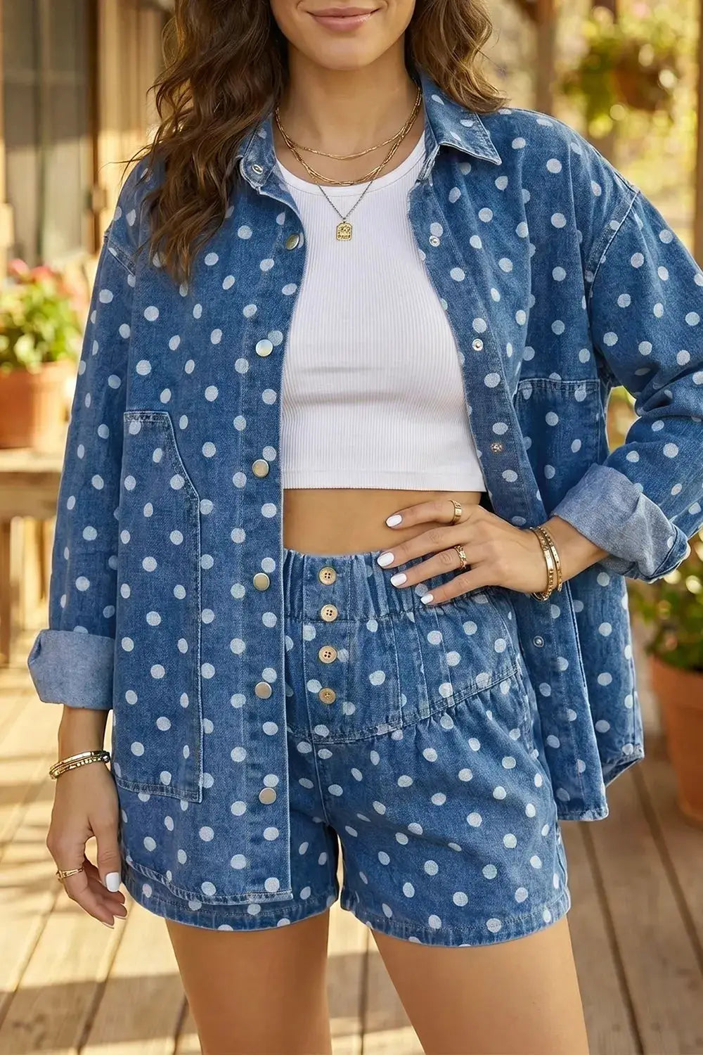 Polka dot denim tunic jacket with long sleeves and utility pockets; button closure; 3pc outfit with shorts and white top