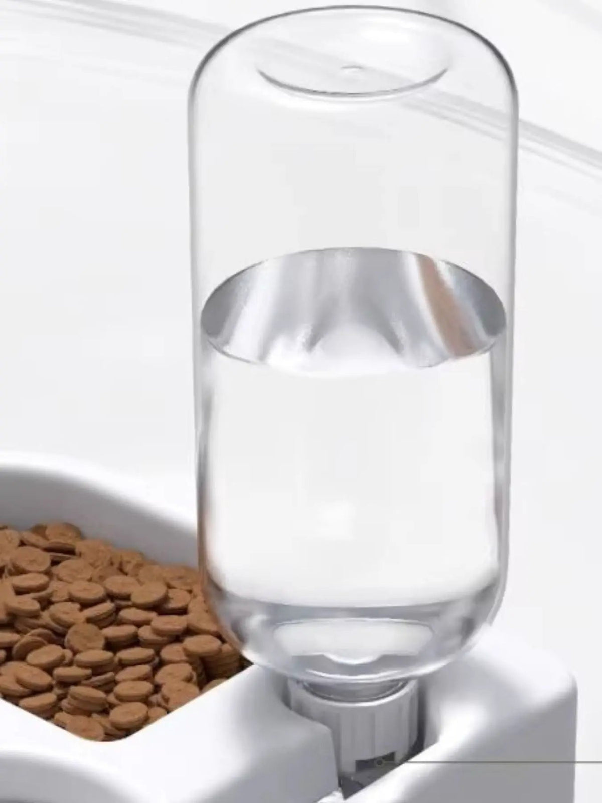 Automatic Water Refilling Pet Bowl by Trendsi; clear glass water reservoir atop a white base with a gray knob