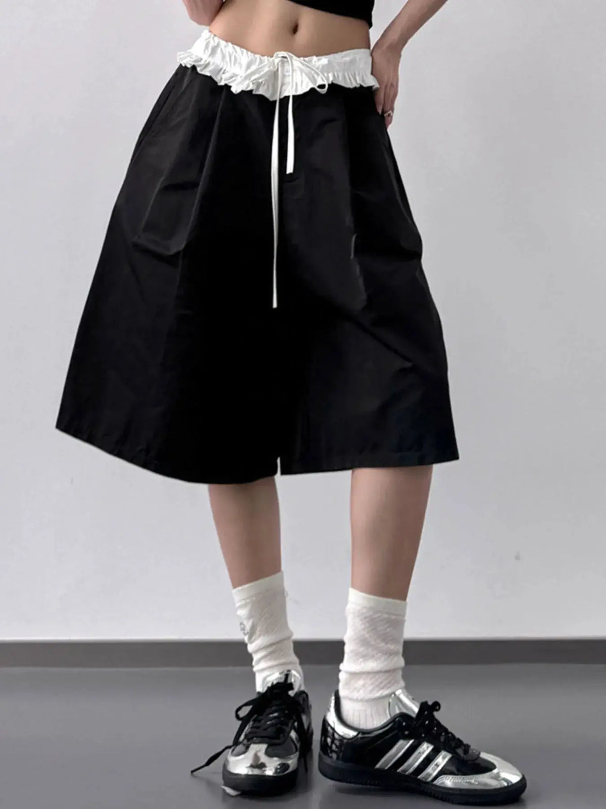 Contrast Waistband Wide-Leg Shorts by Trendsi; black wide-leg shorts with white ruched waistband.
