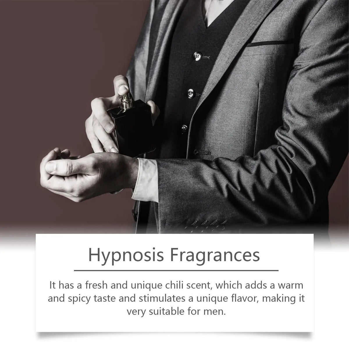 Men's Pheromone Perfume by AdTec bottle held by man in a gray suit