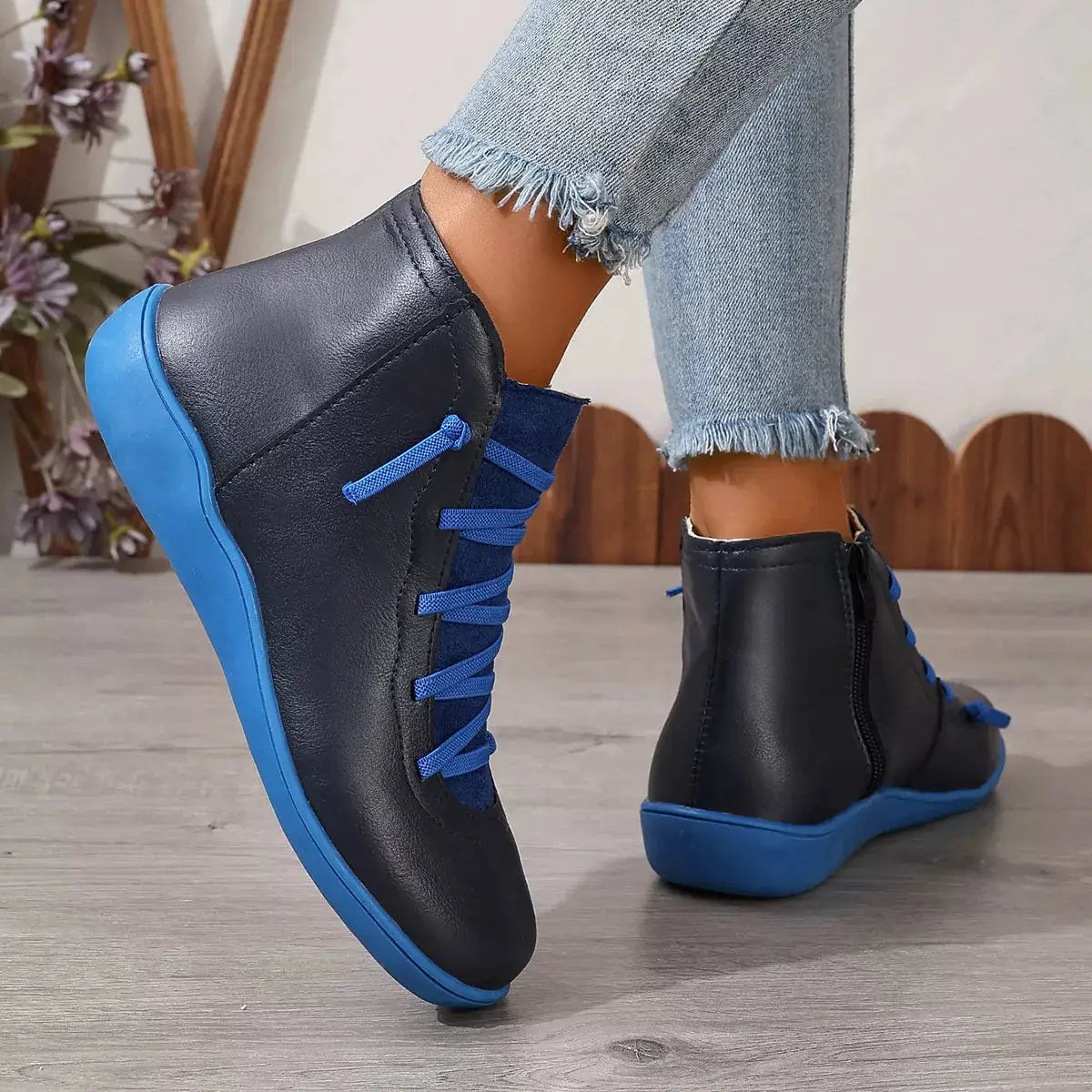 Lace-Up Faux Leather Ankle Boots, pair in black with blue laces and blue sole