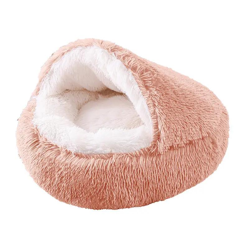 Deep Sleep donut pet bed by AdTec, peach plush exterior with white fluffy interior, semi-enclosed round design