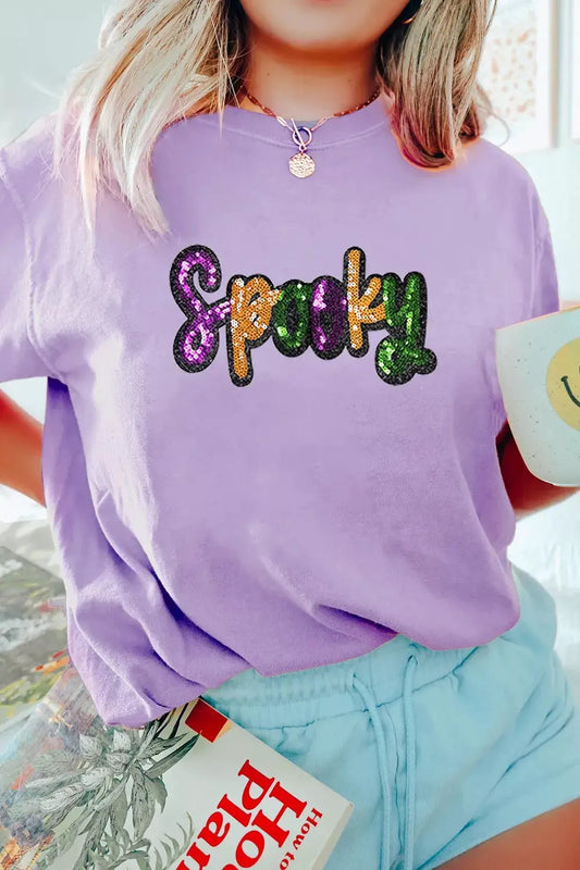 Plus-size lavender cotton-blend T-shirt with multicolor sequin lettering spelling Spooky